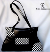 Rita Azzellini � la collezione e firma di una azienda artigianale che porta il suo nome e che si colloca, per consenso e diritto, nel multiforme mondo della moda e della creazione tipicamente italiana. Da Designer di "Borse e Pellame", Rita vanta inizi assai precoci avendo appreso, sin da giovanissima, l'arte della "creazione" durante un lungo percorso di apprendimento e supporto accanto ad autentici Maestri del settore